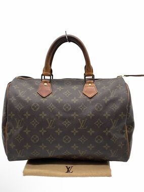 Louis Vuitton Monogram Canvas Duffel Bag in Brown
